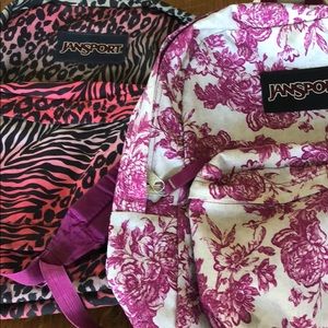 2 Jansport pink floral and animal print backpack